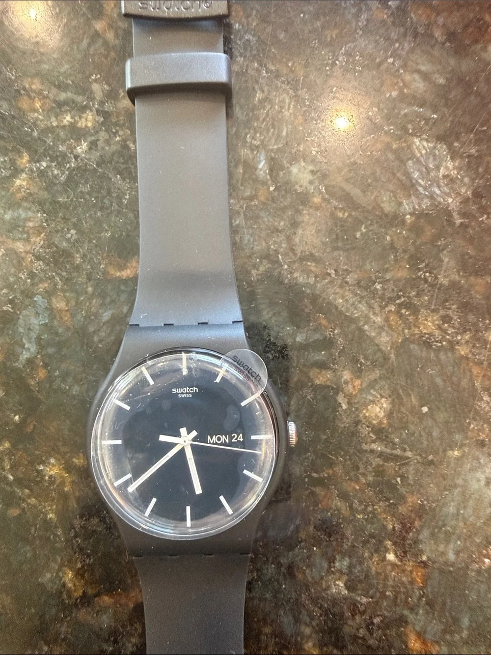 Swatch Black Silicone Strap Watch with Blackish/Grey dial.